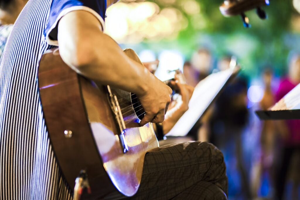 Why Is Singapore So Strict? 24 Rules To Know Before Visiting 11 Busking Public Street Singing Guitar
