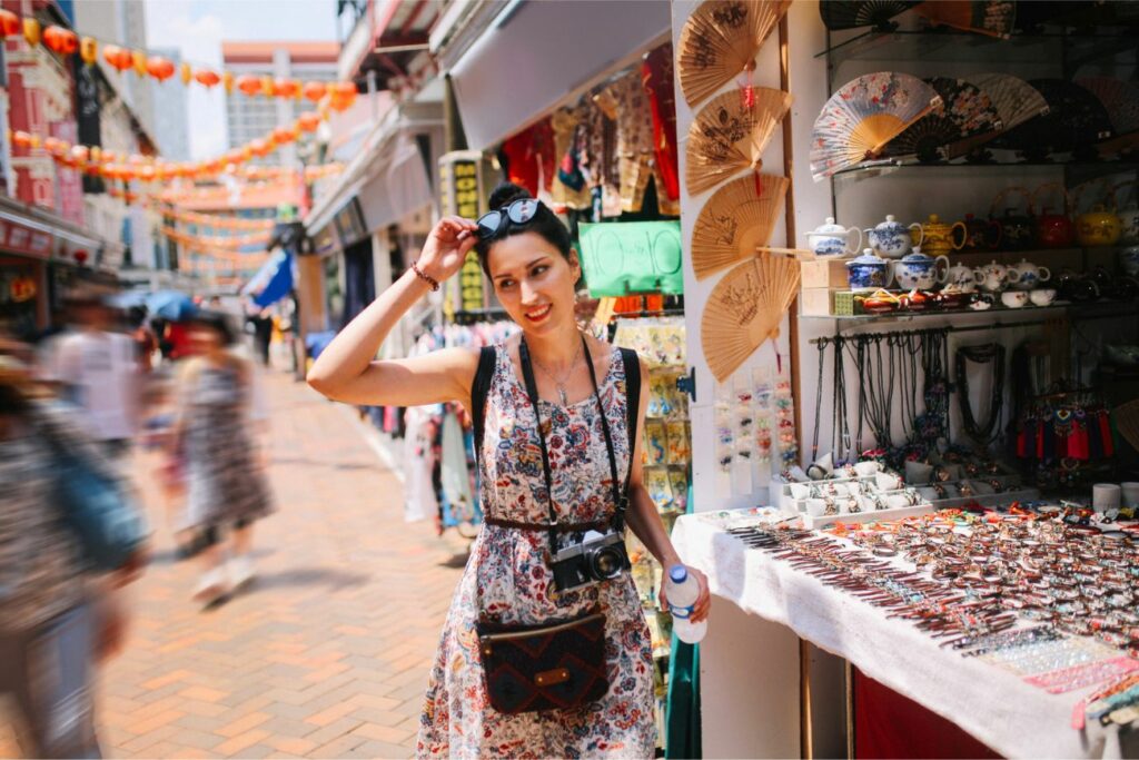 Solo traveler woman shopping Singapore Chinatown