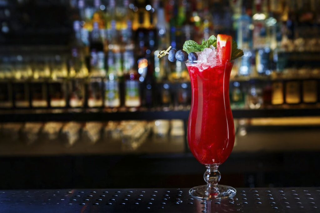 Drinking In Singapore: Your Guide To A Stress-Free Night Out 1 Singapore Sling Cocktail Is On The Bar Counter