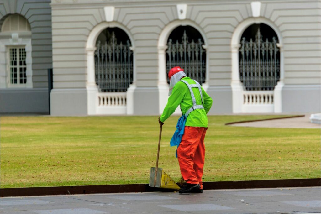 Street Sweeper Uniform Cleaning Pavement