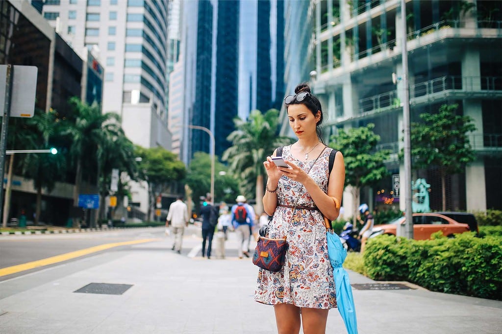 Young Woman Walking Looking Mobile Phone Singapore Downtown District