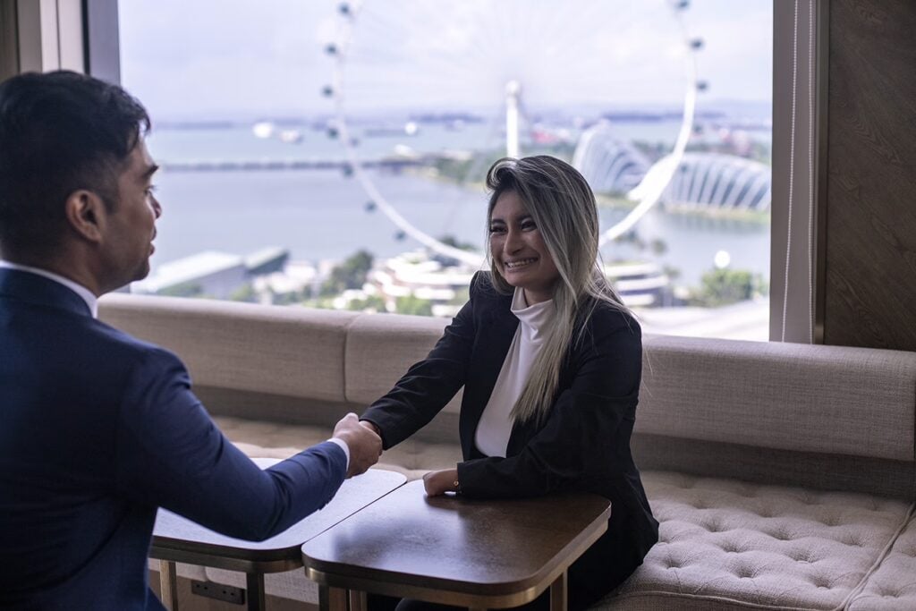 Diverse Business Meetings Handshake Singapore Landmark