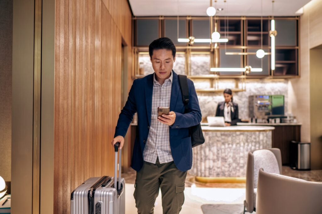 Well Dressed Affluent Asian Business Traveler Exclusive Airport Lounge