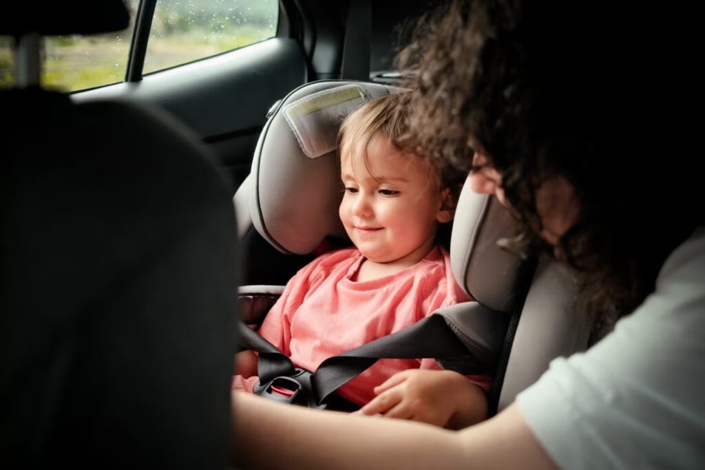 Mother Fastening Seat Belt Baby Boy Car Seat